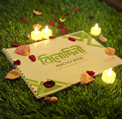 Binodini mehndi Practice Book on grass with candles